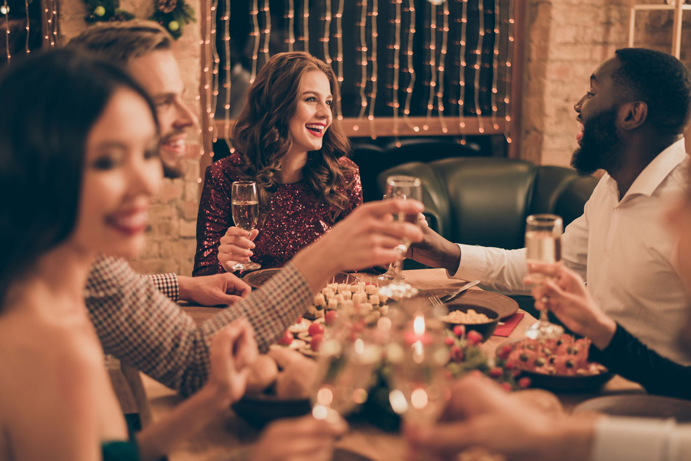 Friends Enjoying a Holiday Dinner Party | Blog | Greystar